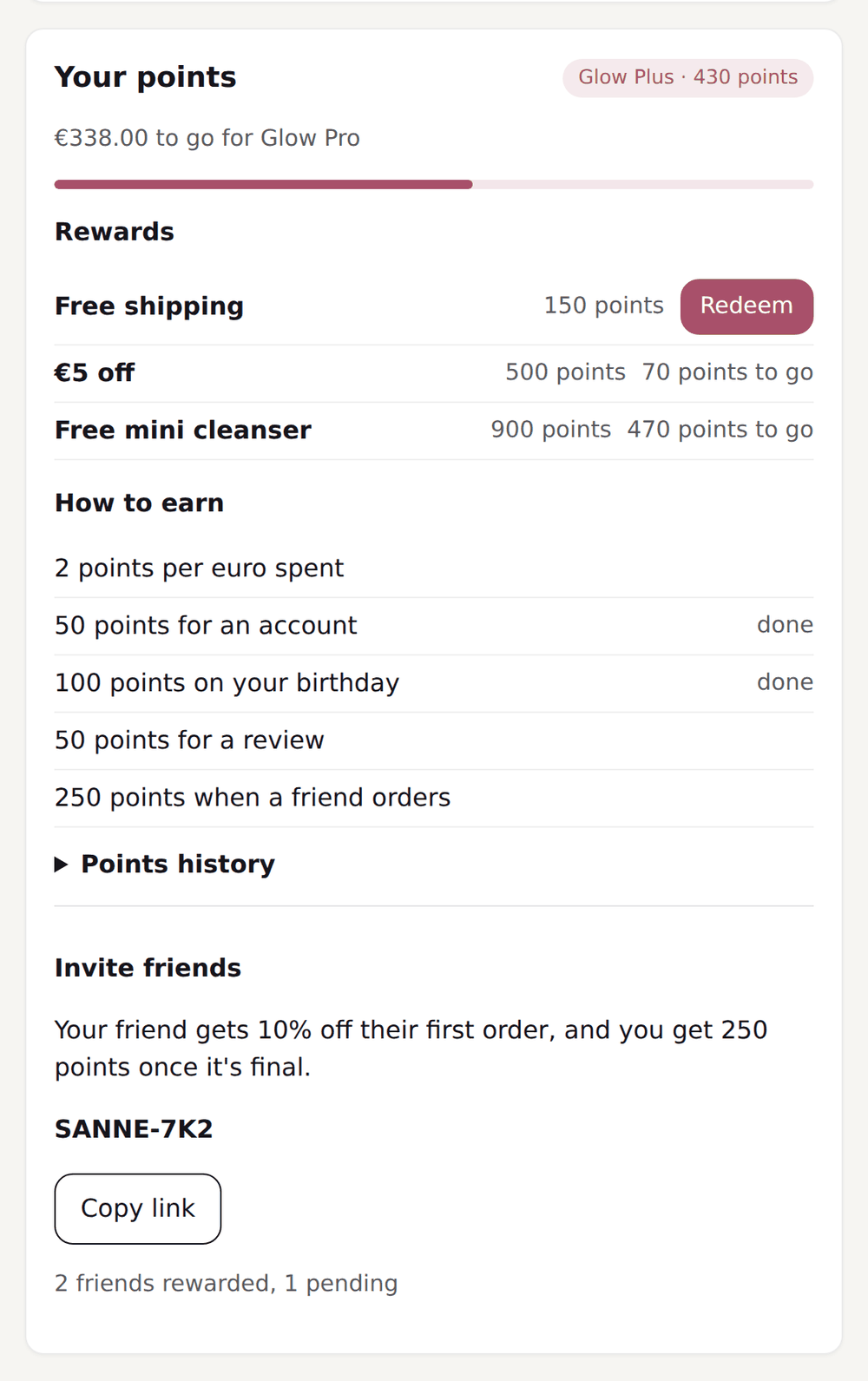 Customer portal of a skincare brand with the point balance, the tier, the rewards and the ways to earn