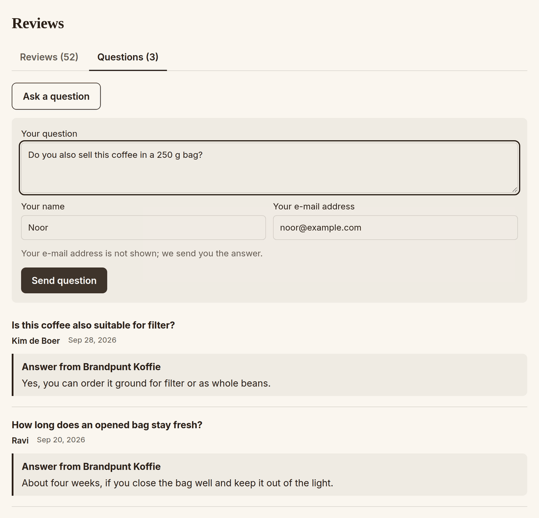 Questions tab in the review block: a form to ask a question and two answered questions with the shop's answer under each